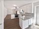 Bright kitchen featuring white cabinets, stainless steel appliances, and granite countertops at 2622 Abington Dr, Snellville, GA 30078