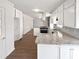 Bright kitchen featuring white cabinets, stainless steel appliances, and granite countertops at 2622 Abington Dr, Snellville, GA 30078