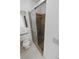 Bathroom featuring tile floors, shower stall, and a toilet at 1302 Milstead Ne Trce, Marietta, GA 30066