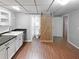 Compact bathroom with a sliding barn door at 1302 Milstead Ne Trce, Marietta, GA 30066