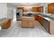 Spacious kitchen featuring granite countertops, stainless steel appliances and a large island at 1302 Milstead Ne Trce, Marietta, GA 30066