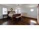 Spacious bedroom with hardwood floors, ample natural light, and a charming accent mirror at 1537 Harts Mill Ne Rd, Brookhaven, GA 30319