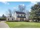 Well-maintained front lawn leading to a stylish two-story home with modern accents and ample greenery at 1537 Harts Mill Ne Rd, Brookhaven, GA 30319