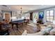Spacious game room featuring a pool table, hardwood floors, and a stylish bar area for entertaining guests at 1537 Harts Mill Ne Rd, Brookhaven, GA 30319