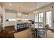 Bright, modern kitchen featuring stainless steel appliances, granite countertops, and an eat-in dining area at 1537 Harts Mill Ne Rd, Brookhaven, GA 30319