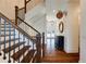 Beautiful staircase with dark wood railings and white risers leading to the upper level at 1537 Harts Mill Ne Rd, Brookhaven, GA 30319