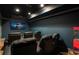 Home theater with comfortable seating, a large screen, and a popcorn machine for the ultimate viewing experience at 1537 Harts Mill Ne Rd, Brookhaven, GA 30319
