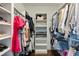 Organized walk-in closet features custom shelving and ample storage space for clothing at 1537 Harts Mill Ne Rd, Brookhaven, GA 30319