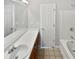 Bathroom with a white countertop, cabinets, and a shower-tub combo at 1100 Cotton Gin Dr, Woodstock, GA 30188