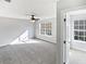 Bright bedroom with large windows, ceiling fan and neutral carpeting at 1100 Cotton Gin Dr, Woodstock, GA 30188