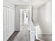 Upstairs hallway features carpet, fresh paint, and access to bedrooms at 1100 Cotton Gin Dr, Woodstock, GA 30188
