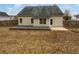 Backyard featuring a wooden deck and a fenced yard, offering a private and outdoor space at 213 Ermines Way, Mcdonough, GA 30253