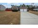 Charming two-story brick home with a two-car garage and a well-maintained front yard at 213 Ermines Way, Mcdonough, GA 30253