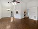 Spacious living room with hardwood floors and a chandelier at 213 Ermines Way, Mcdonough, GA 30253