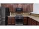 Modern kitchen features stainless appliances, and ample cabinet space at 2230 Atkinson Park Dr, Lawrenceville, GA 30043