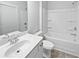 Full bathroom features a tub-shower combo, white vanity and a toilet at 2976 Rambler Dr, Loganville, GA 30052