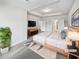 Relaxing main bedroom boasts a tray ceiling, plush carpet, and an inviting ensuite bathroom at 2976 Rambler Dr, Loganville, GA 30052