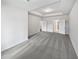 Bright main bedroom features a tray ceiling, carpet, and access to the ensuite bathroom at 2976 Rambler Dr, Loganville, GA 30052