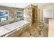 Bathroom with a jacuzzi tub and a walk in shower at 7040 Northgreen Dr, Atlanta, GA 30328