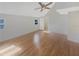 Bedroom featuring hardwood floors and a ceiling fan at 7040 Northgreen Dr, Atlanta, GA 30328