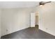 Bedroom featuring carpet, neutral-toned walls, a ceiling fan and a closet at 7040 Northgreen Dr, Atlanta, GA 30328