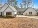 Beautiful exterior view of a charming house with a well-maintained front yard at 7040 Northgreen Dr, Atlanta, GA 30328