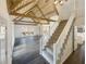 Living room featuring vaulted ceiling, hardwood floors, and natural light at 7040 Northgreen Dr, Atlanta, GA 30328