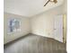 This spacious bedroom has a large window and is awaiting your personal touch at 7040 Northgreen Dr, Atlanta, GA 30328