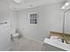 Bathroom with a tiled floor, sink, vanity and toilet at 7088 Blairs View Dr # 4, Austell, GA 30168