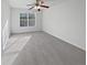 Bedroom featuring a ceiling fan and natural light from a window at 7088 Blairs View Dr # 4, Austell, GA 30168