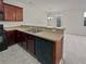 Kitchen with updated countertops, black appliances, and plenty of cabinet space at 7088 Blairs View Dr # 4, Austell, GA 30168
