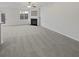 Spacious living room with fireplace and ample natural light ready for furnishing at 7088 Blairs View Dr # 4, Austell, GA 30168