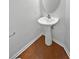 Small powder room featuring a pedestal sink, and tile flooring at 7088 Blairs View Dr # 4, Austell, GA 30168