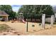 Community playground with swings and slides, perfect for children at 4586 Duane Dr, Buford, GA 30519