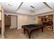 Spacious game room in finished basement features a pool table, recessed lights and a pendant light at 2875 Ivy Brook Ln, Buford, GA 30519