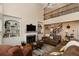 Comfortable living room features a fireplace, built-in shelving, and an open floor plan at 2875 Ivy Brook Ln, Buford, GA 30519