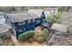 Aerial view of the home's backyard, deck, and unique treehouse style structure at 3894 Foxford Dr, Atlanta, GA 30340