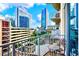 City views from condo balcony with seating and a metal railing at 860 Peachtree St # 811, Atlanta, GA 30308