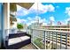 Condo balcony with outdoor seating overlooking the city at 860 Peachtree St # 811, Atlanta, GA 30308