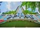 Unique building entrance with modern architecture and landscaping at 860 Peachtree St # 811, Atlanta, GA 30308