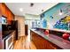 Modern kitchen with stainless steel appliances, tile backsplash and wood cabinets at 860 Peachtree St # 811, Atlanta, GA 30308