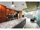 Modern kitchen with stainless steel appliances and granite countertops at 860 Peachtree St # 811, Atlanta, GA 30308