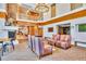 Bright lobby features a fireplace, ample seating, and a spiral staircase leading to the second level at 860 Peachtree St # 811, Atlanta, GA 30308