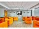 Movie room featuring rows of comfy yellow chairs and a large screen for immersive viewing at 860 Peachtree St # 811, Atlanta, GA 30308
