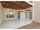 Back patio with multiple sliding doors, tiled floors, and a wood ceiling at 5300 Brooke Ridge Dr, Dunwoody, GA 30338