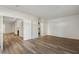 Bedroom featuring wood floors, and a connecting view to living room at 5300 Brooke Ridge Dr, Dunwoody, GA 30338