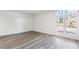 Bedroom featuring wood floors and plantation shutters at 5300 Brooke Ridge Dr, Atlanta, GA 30338