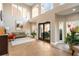 A spacious, light-filled lobby features tiled floors, a sitting area and large windows at 5300 Brooke Ridge Dr, Dunwoody, GA 30338