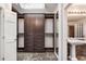 Spacious closet featuring shelving and storage, leading into bathroom at 5300 Brooke Ridge Dr, Dunwoody, GA 30338