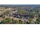 Beautiful aerial view of the neighborhood with mature trees and well-maintained homes at 672 Red Sunset Cir, Powder Springs, GA 30127